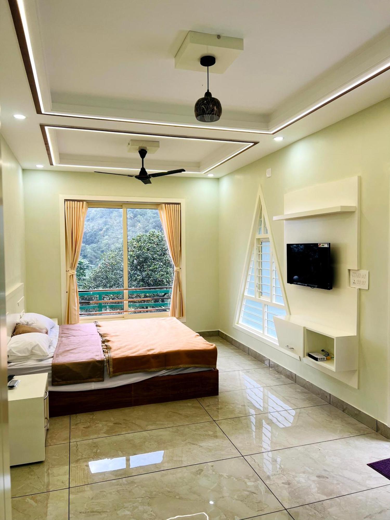 Royal Mount Inn Resorts Paithalmala Quarto foto